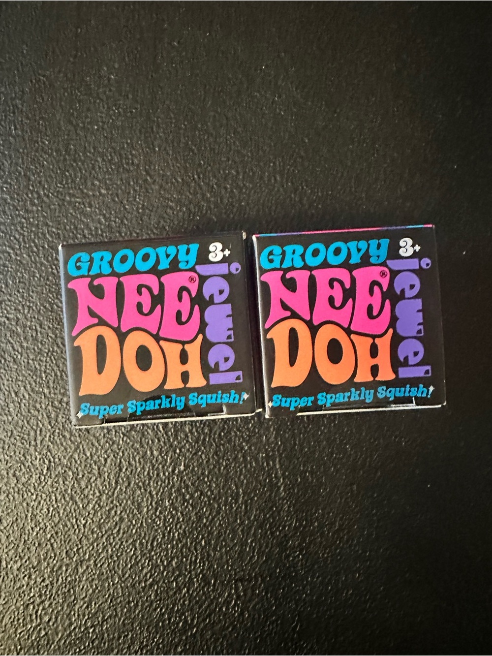 Groovy jewel  NeeDoh Super Sparkly Squish -mini